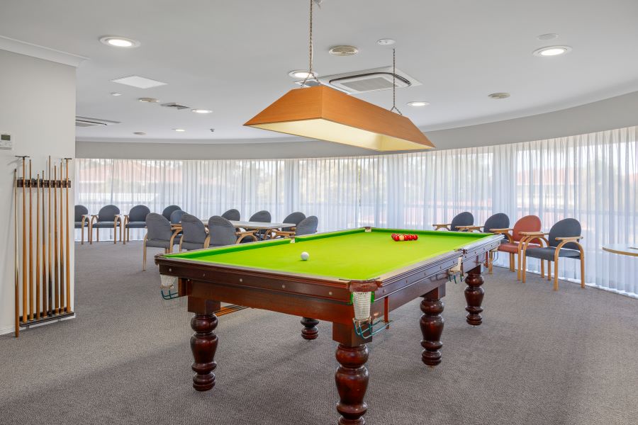 Communal billiards room