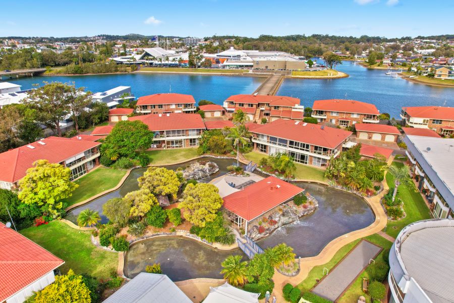 Birds eye view of the residences and pond