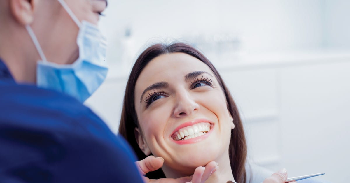 Woman smiling at dentist