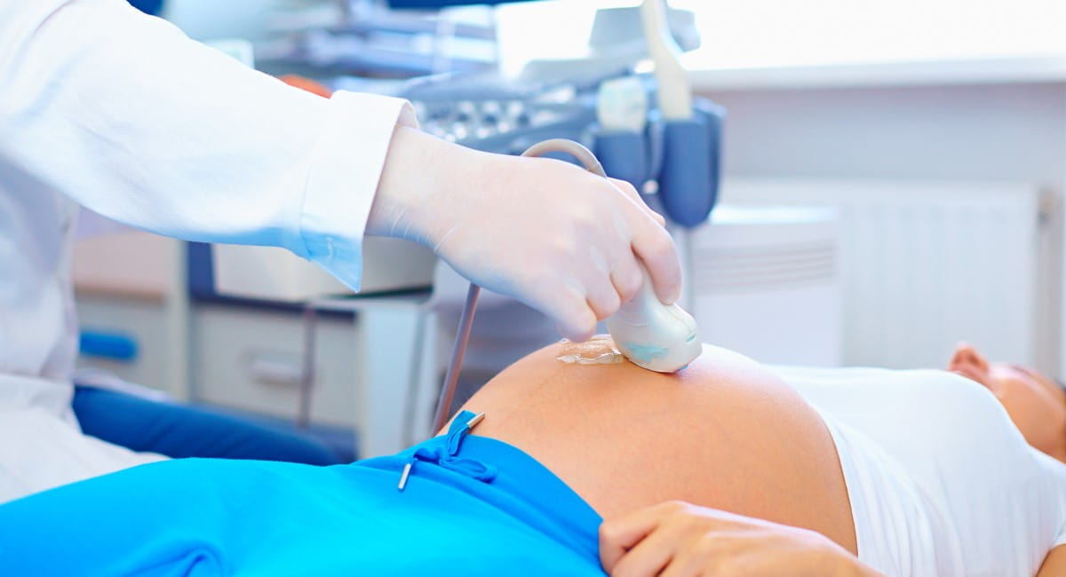 Pregnant woman receiving an ultrasound